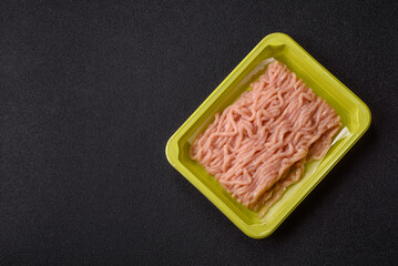 Raw ground chicken for burgers and other food. Raw minced chicken meat