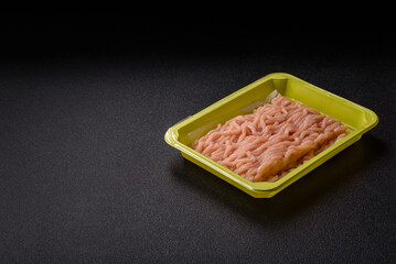 Raw ground chicken for burgers and other food. Raw minced chicken meat