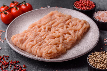 Raw ground chicken for burgers and other food. Raw minced chicken meat