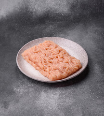 Raw ground chicken for burgers and other food. Raw minced chicken meat