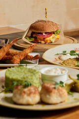tasty feast displayed, delicious meal with assorted treats, image showcasing savory foods and crispy snacks