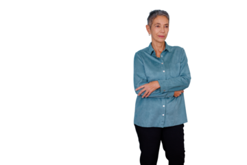 Mature senior businesswoman standing confidently with arms crossed, looking away, gray short hair