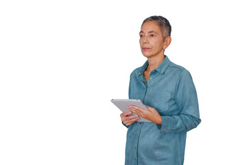 Senior woman holding digital tablet, looking away in profile, contemplating business technology and future innovation