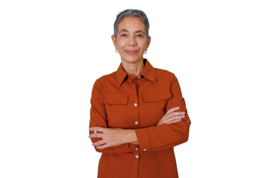 Confident mature businesswoman showing leadership, smiling with arms crossed, standing over a transparent background - Powered by Adobe