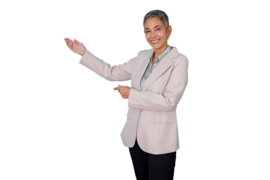 Confident mature businesswoman smiling, presenting copy space, welcoming and directing attention with hand gestures, transparent background