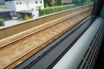 View From Moving Train Window: Motion Blur of Railway Tracks and Scenery