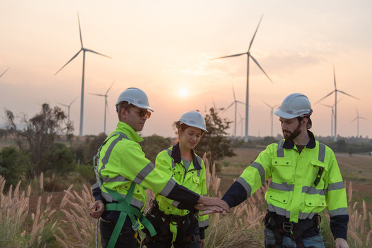 Wind Turbine Maintenance and Repair Technician, Engineer Checking Turbines working maintenance clean power generator system