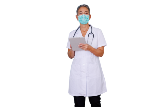Medical professional woman wearing a face mask and stethoscope, holding a tablet for telehealth or patient data management