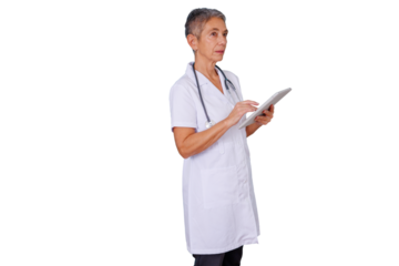 Senior woman doctor wearing a lab coat and stethoscope, using a tablet for healthcare information and patient data