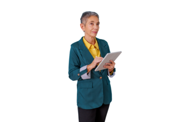 Mature business woman using digital tablet, standing, looking away with thoughtful expression, transparent background