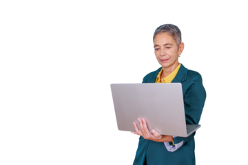 Senior businesswoman working on laptop, managing tasks, embracing technology, transparent background for easy use