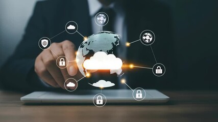 Man in suit using tablet showing cloud computing, security, and connectivity concepts - Powered by Adobe