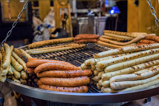 Various sausages on a grill at the Christmas Market in Strasbourg, France