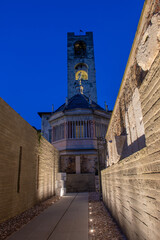 Bell tower of the old square with the baptistery