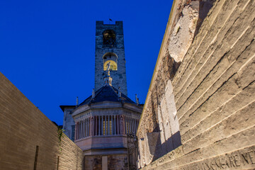 Bell tower of the old square with the baptistery