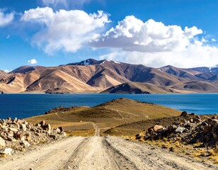 Mountain lake view down a dirt path