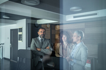 Business people having a discussion in modern office