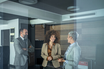 Business colleagues collaborating together in an office meeting