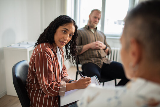 Young adults in focused group therapy at counseling office
