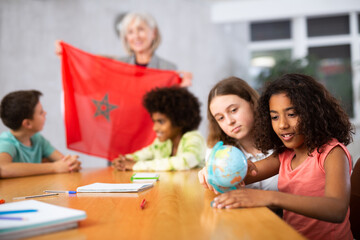 Kids learning together about morocco in geography class