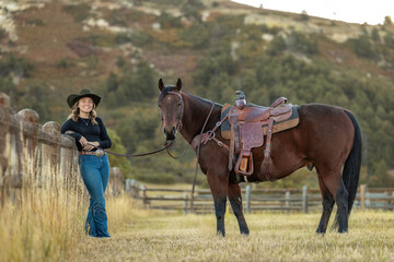 Colorado cowgirl riding bay quarter horse ranch front range portrait
