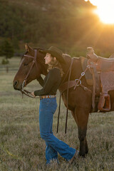 Colorado cowgirl riding bay quarter horse ranch front range portrait