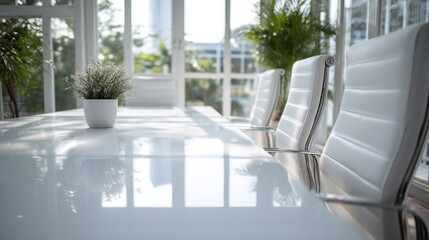 Bright modern meeting room interior with shiny table and design chairs