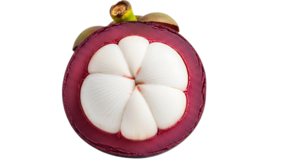Close up of a sliced mangosteen fruit showing the white segments and purple rind on black background