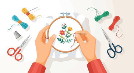 A person engaged in the creative hobby of hand embroidery, stitching a colorful floral pattern onto fabric held in a hoop with surrounding tools © Elsa