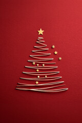 Minimalist Metallic Ribbon Christmas Tree with Star and Ornaments on Red Glitter Background