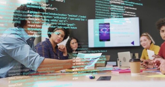 Discussing six-person team in smart casual reviewing app in office with wall monitor and laptop - Powered by Adobe