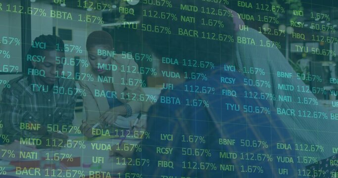 Analyzing six colleagues in business-casual leaning toward laptops at table, with market ticker