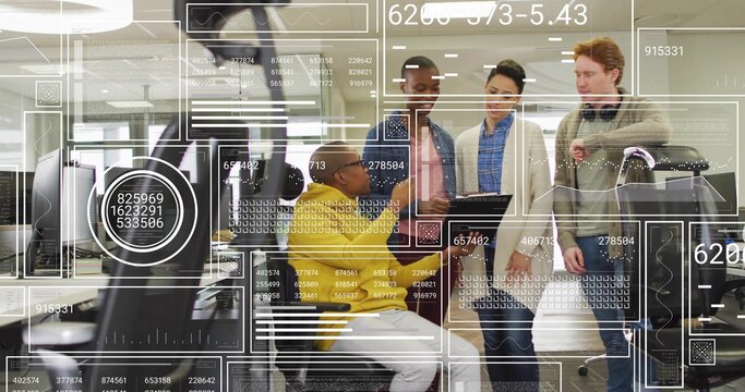 Reviewing coworker in yellow sweater leaning at desk viewing AR overlays laptop tablet suitcase