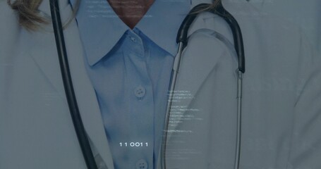 Showing senior clinician wearing lab coat and blue shirt at clinic with stethoscope 110011 overlay
