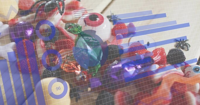 Fototapeta Displaying cluster of vivid beads, faceted gems, berry beads, toy eyes, chain on desk with overlay