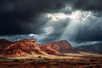 Obraz premium Red sandstone plateau under heavy storm clouds in a dramatic wide scene.
