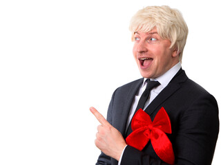 Concept of winter holidays. Happy man shaking gift. Celebration. Funny man face. Male. Photo. White background. Present