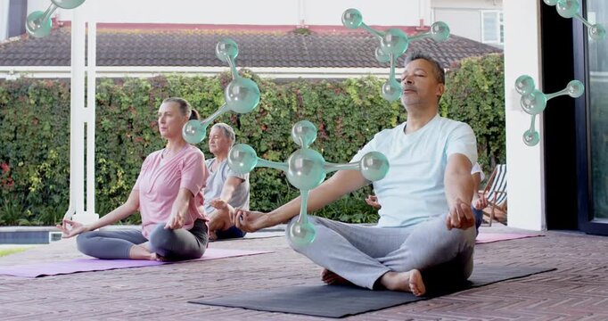 Leader cueing, group opening palms and settling into wellness, molecules growing over patio
