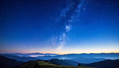 星が瞬く夜空の光が広がるリラクゼーション夜景背景