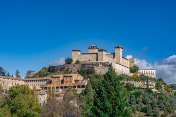 Fototapeta premium Aerial View of Rocca Albornoziana Fortress and Medieval Ponte delle Torri Aqueduct, Umbria
