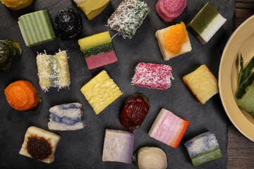 Traditional Malaysian desert Nonyah Kuih making preparing ingredients panadn leaf shredded coconut...