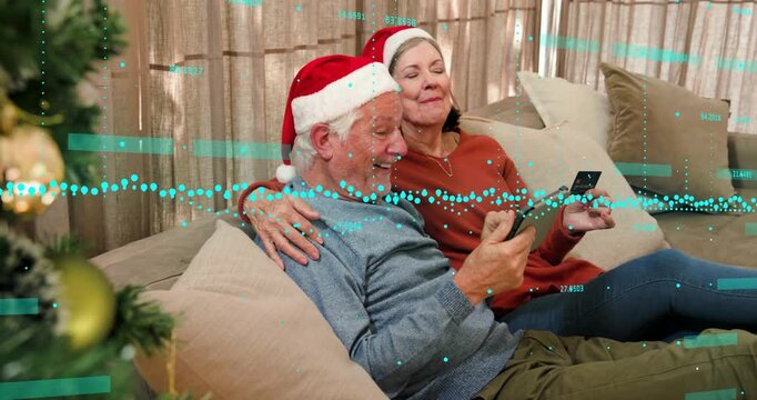 Pair with Santa hats, woman showing card urging man scrolling phone buying, turquoise bars sweeping
