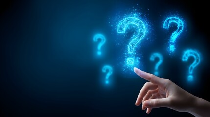 Hand touching glowing question marks on dark blue background.