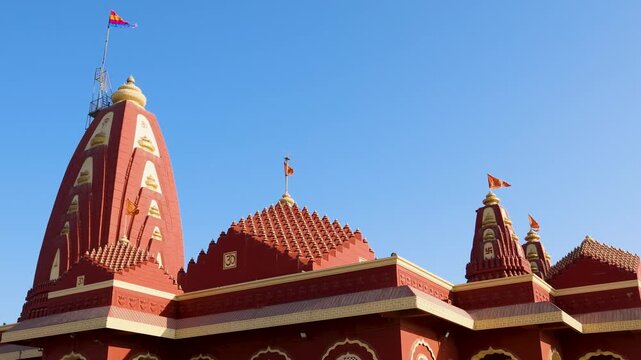 stunning hindu shrine building with ornate carvings and domes