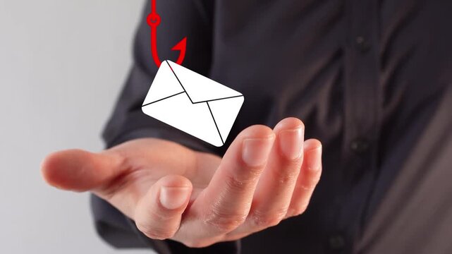 Close-up of a businesswoman's hand holding a phishing email animation