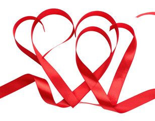 Two intertwined red ribbon hearts on black background, conveying love and connection