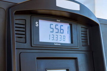 Fototapeta premium Gas station pump displays total sale amount gallons pumped