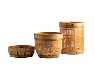 Three rustic, handcrafted bamboo baskets, varying in size, set against a black backdrop