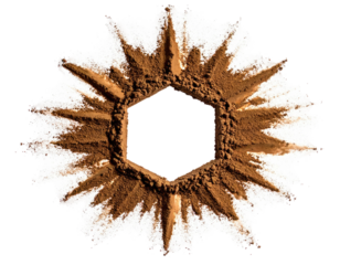 Brown powder forms a starburst-like shape around a central hexagonal void