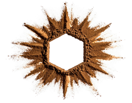 Brown powder forms a starburst-like shape around a central hexagonal void